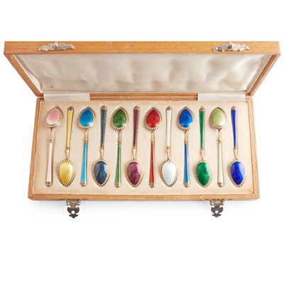 Lot 10 - A cased matched set of silver gilt and enamelled Russian coffee spoons