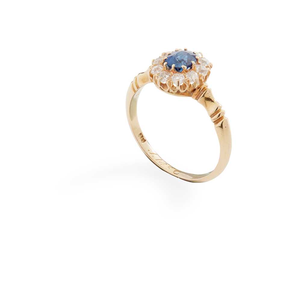Lot 8 - A sapphire and diamond cluster ring