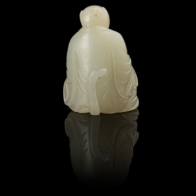 Lot 127 - WHITE JADE CARVING OF A TIGER DEITY