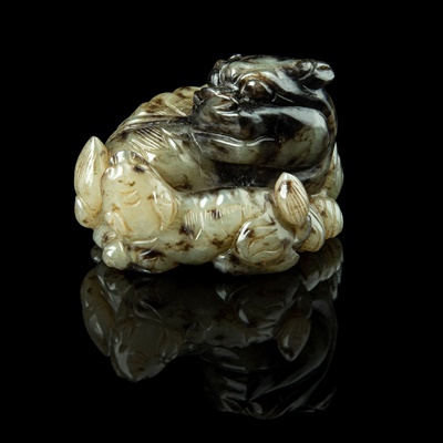 Lot 123 - PALE CELADON JADE CARVING OF A QILIN AND CUB