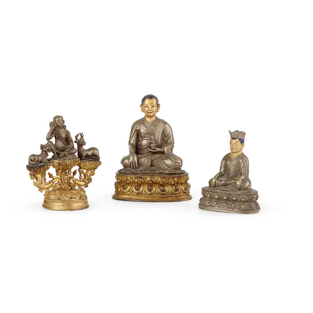 Lot 56 - GROUP OF THREE SILVER AND GILT COPPER ALLOY FIGURES OF BUDDHIST MASTERS