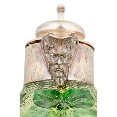 Lot 53 - An Edwardian silver mounted Art Nouveau claret jug