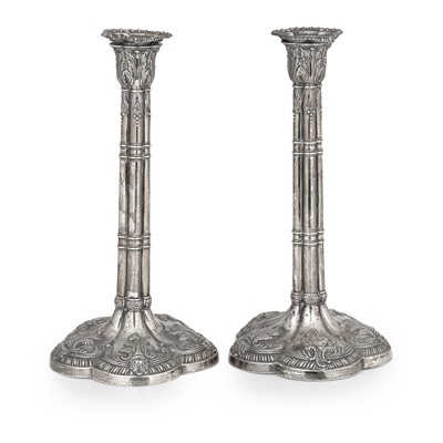 Lot 107 - A pair of George III table candlesticks