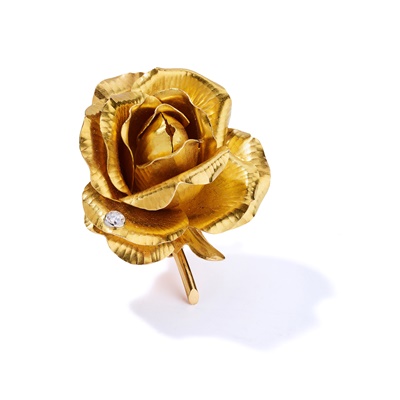 Lot 22 - Cartier: A diamond-set flower brooch, 1961