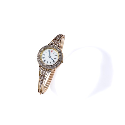 Lot 75 - An early 20th century diamond watch bangle, circa 1907