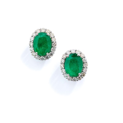 Lot 15 - A pair of emerald and diamond cluster earrings