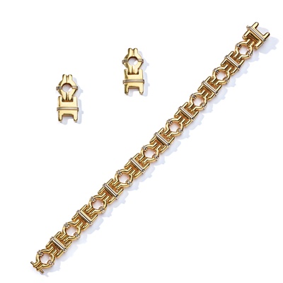 Lot 86 - Kria: A fancy-link bracelet and earrings