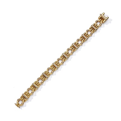 Lot 86 - Kria: A fancy-link bracelet and earrings