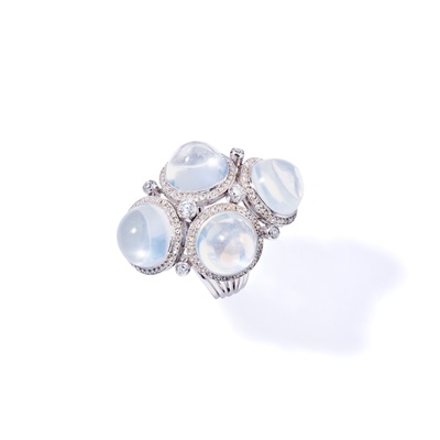 Lot 81 - A moonstone and diamond dress ring