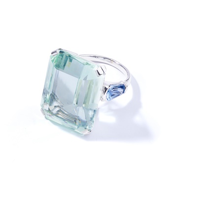 Lot 60 - An aquamarine and sapphire dress ring