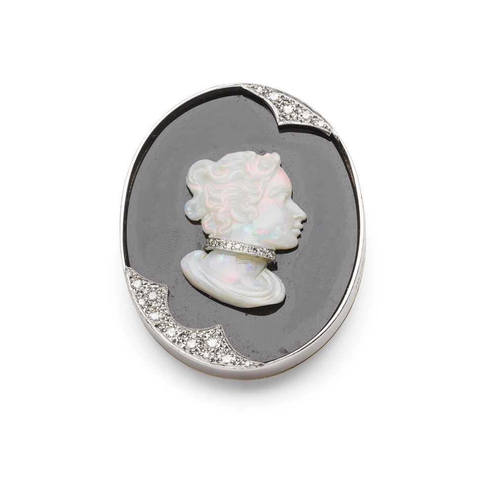 Lot 32 - An opal, onyx and diamond cameo brooch