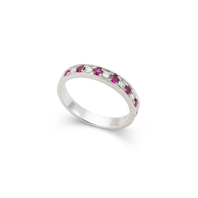 Lot 166 - A ruby and diamond half-eternity ring