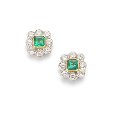 Lot 144 - A pair of emerald and diamond cluster earrings