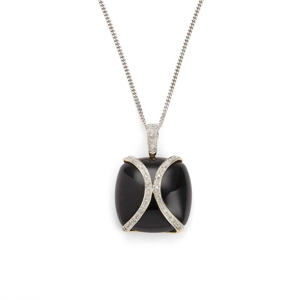 Lot 40 - An onyx and diamond pendant