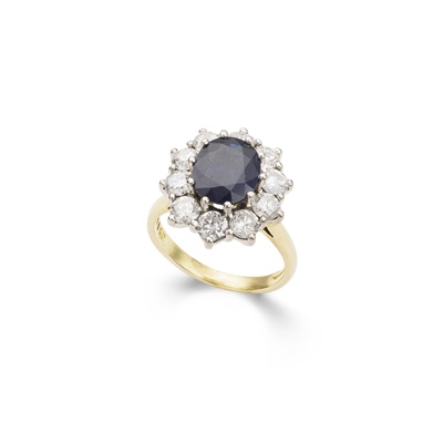 Lot 223 - A sapphire and diamond cluster ring