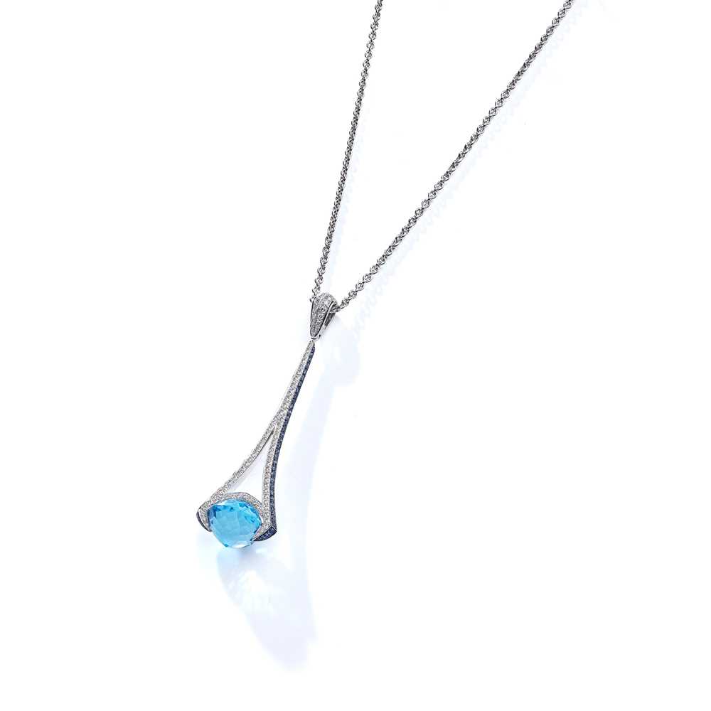 Lot 127 - A blue topaz, diamond and sapphire pendant
