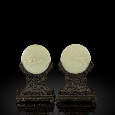 Lot 99 - FINELY CARVED AND RARE PAIR OF PALE CELADON JADE TABLE SCREENS WITH ZITAN STANDS