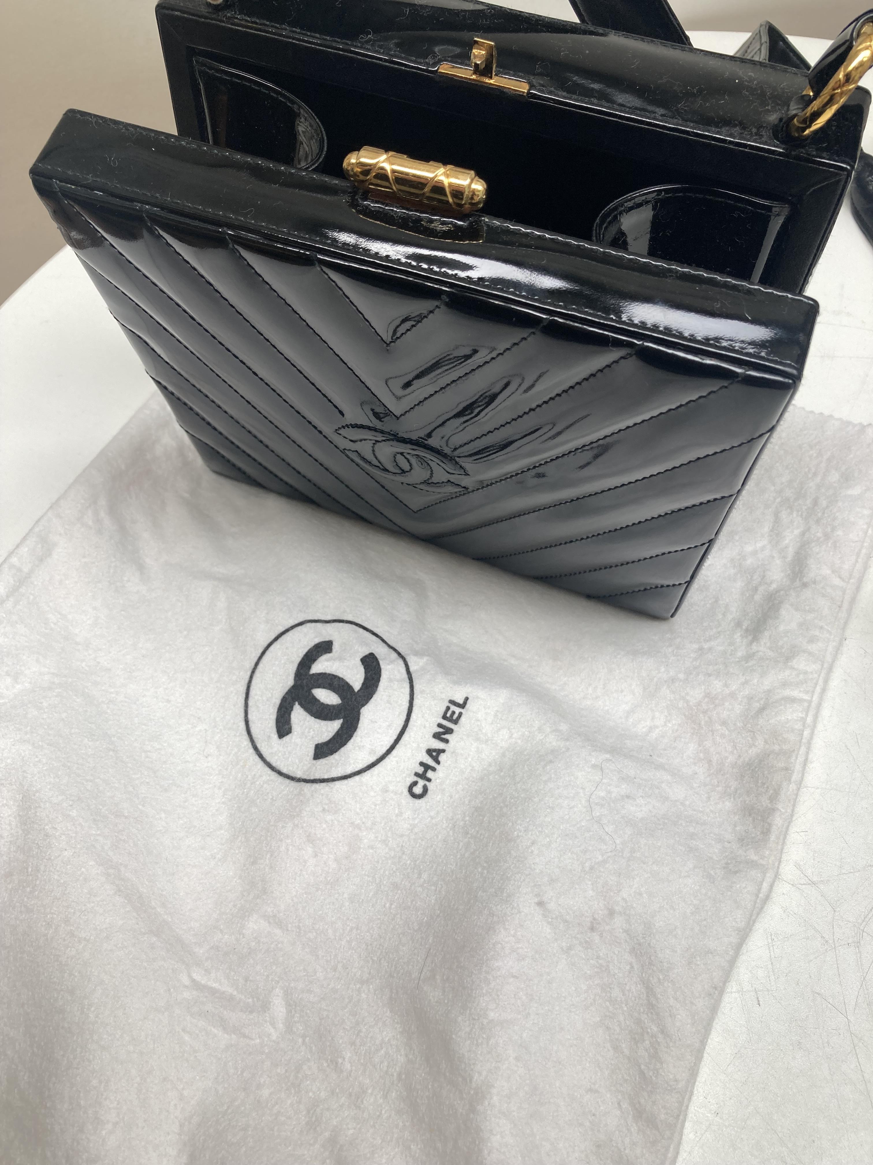 Lot 13 - Chanel: A black patent leather hinged box bag