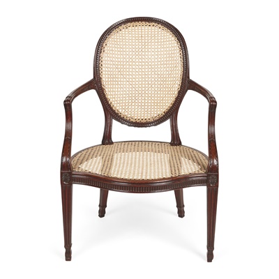 Lot 129 - GEORGE III MAHOGANY AND CANED ARMCHAIR, IN THE MANNER OF JOHN LINNELL