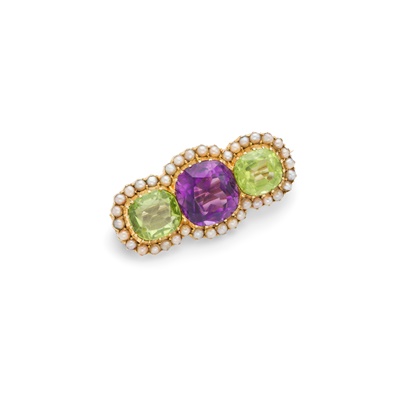 Lot 79 - An early 20th century amethyst, peridot and pearl brooch