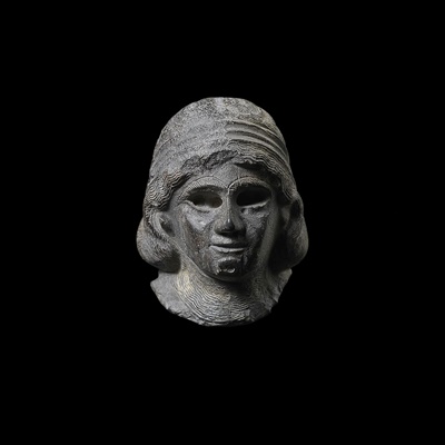 Lot 46 - MESOPOTAMIAN HEAD OF A FEMALE WORSHIPPER