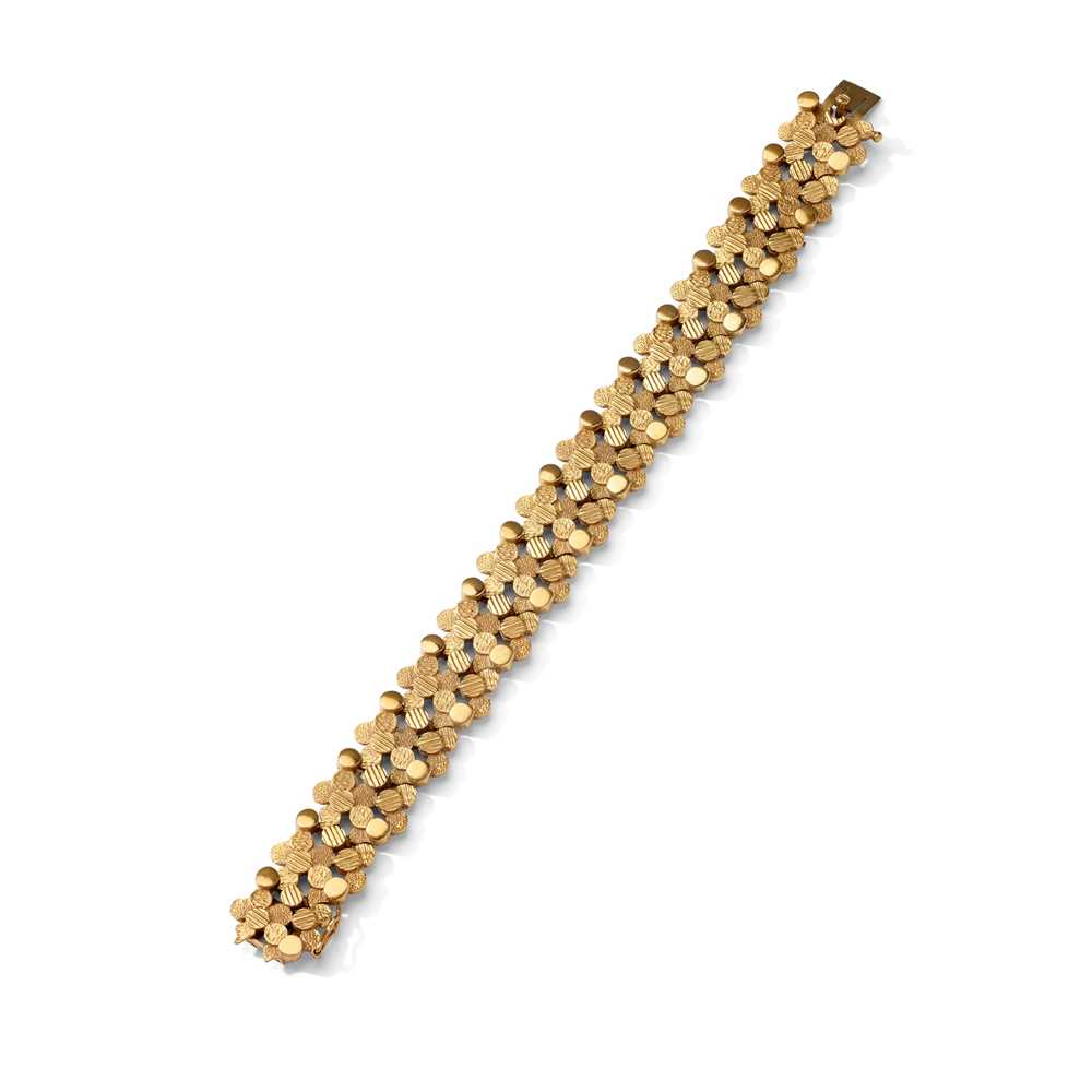 Lot 71 - A 9ct gold fancy-link bracelet, 1975