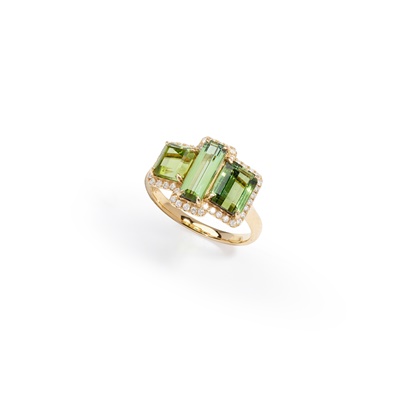 Lot 69 - A green tourmaline and diamond three-stone ring