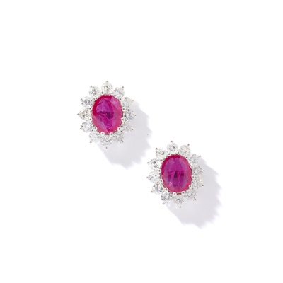 Lot 52 - A pair of ruby and diamond earrings