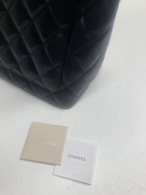 Lot 12 - Chanel: A black caviar Medallion Tote
