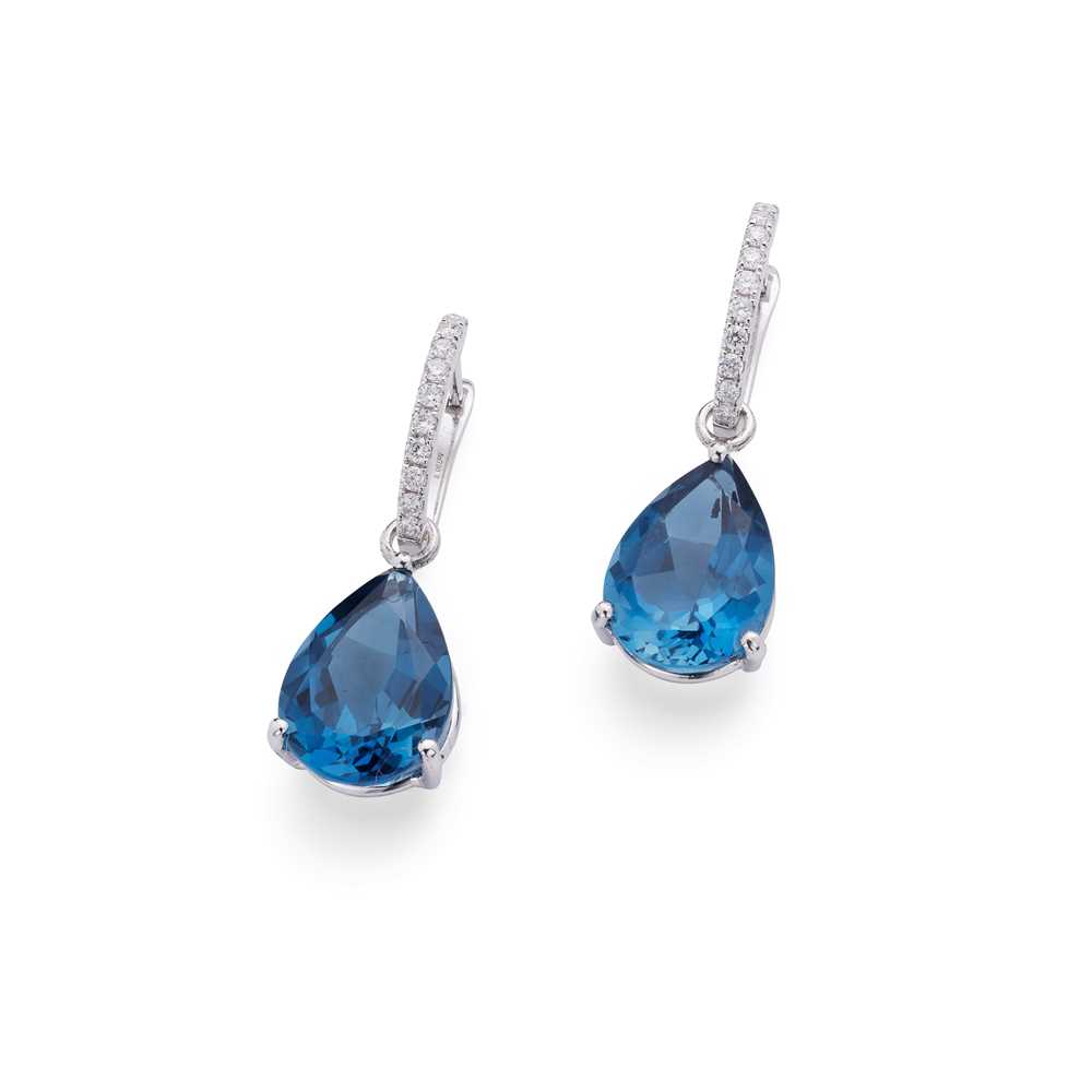 Lot 99 - A pair of blue topaz and diamond pendent earrings