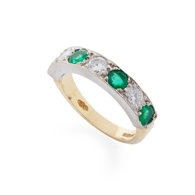 Lot 175 - An emerald and diamond half-eternity ring