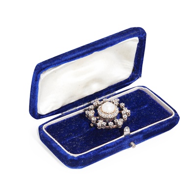 Lot 79 - A half pearl and diamond brooch