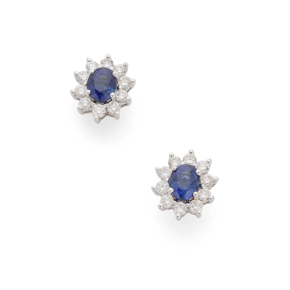 Lot 34 - A pair of sapphire and diamond cluster earrings