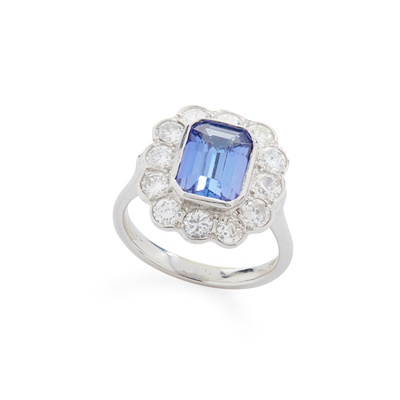 Lot 105 - A Tanzanite and diamond cluster ring