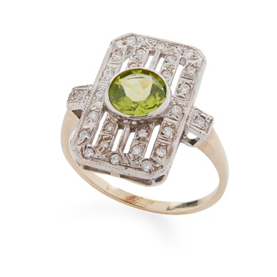 Lot 174 - A peridot and diamond dress ring