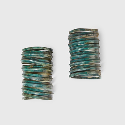 Lot 23 - PAIR OF BRONZE AGE SPIRAL BANGLES