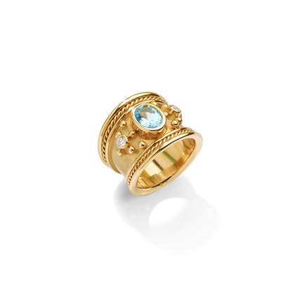 Lot 170 - A topaz and diamond dress ring
