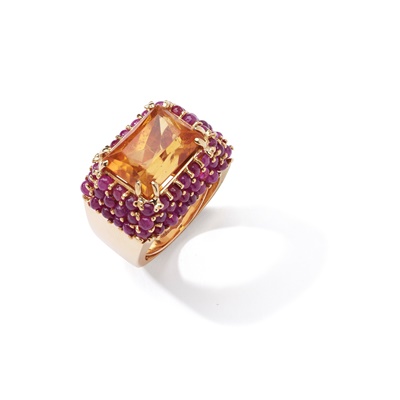 Lot 127 - A citrine and ruby dress ring