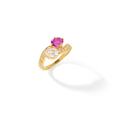 Lot 80 - A pink sapphire and diamond 'Toi et Moi' ring