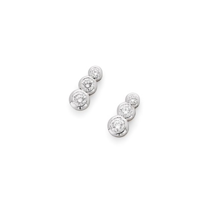 Lot 26 - A pair of diamond earrings
