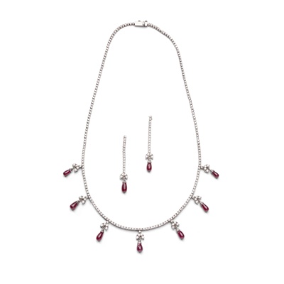 Lot 50 - A ruby and diamond necklace and pair of earrings