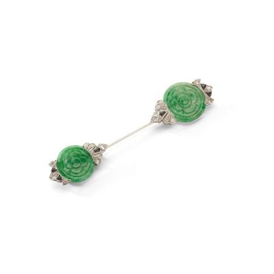 Lot 87 - An Art Deco jade, diamond and onyx jabot pin, circa 1925