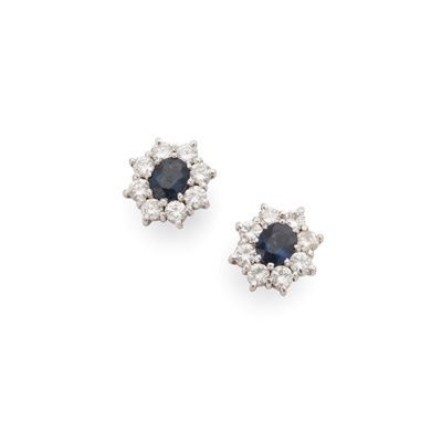 Lot 30 - A pair of sapphire and diamond cluster earrings