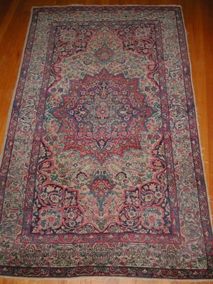 Lot 181 - An Isfahan rug, the cream field with central...