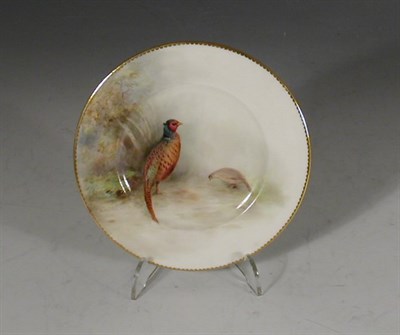 Lot 43 - A small Royal Worcester circular plate, with...