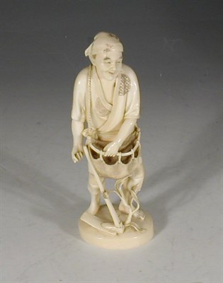 Lot 92 - A late 19th century Japanese carved ivory...