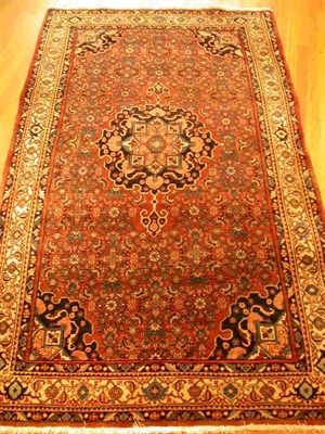 Lot 184 - A Bidjar rug, the red field with allover...