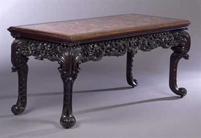 Lot 101 - An Anglo-Indian carved hardwood side table,...
