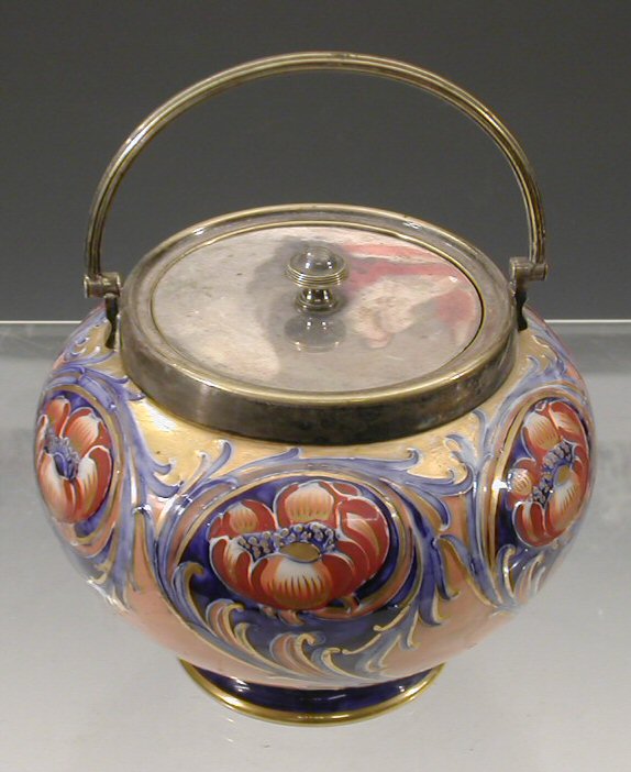 Lot 199 - A Moorcroft 'Florian Ware' biscuit barrel and...