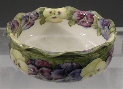 Lot 204 - A Moorcroft circular frilled bowl, decorated...